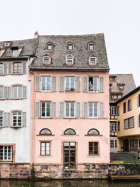 two buildings built side by side, sharing a wall