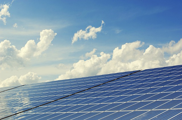 solar panels against a clear blue sky