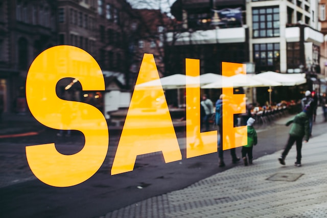 sale reflection on a window