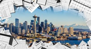 landscape of seattle with calendars, files, and tax forms